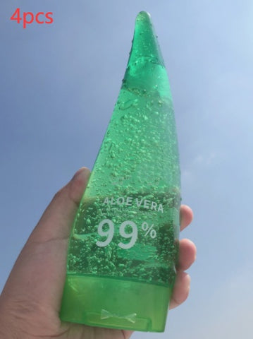 Aloe Gel Skin Care Moisturizing Face Cream in a 99% aloe vera bottle held against a clear blue sky